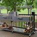 Tagwood BBQ04SS Double Santa Maria grill outdoor patio setup with wood storage shelf below