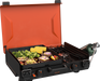 Top view of food cooking on 12x14 black griddle with active side burner