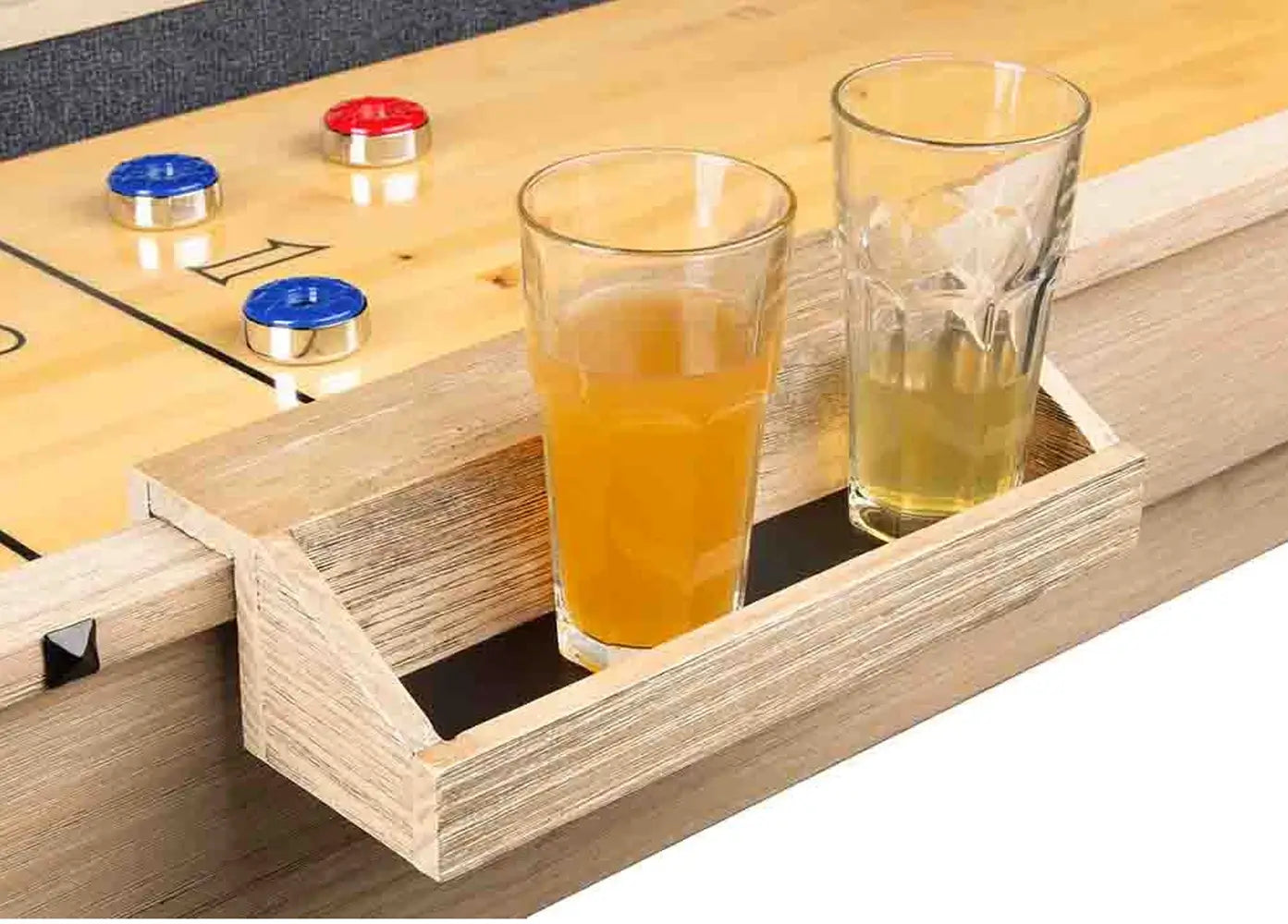 Graphic checklist of included accessories for the Rockford shuffleboard table including pucks, wax, brush, and score keepers.