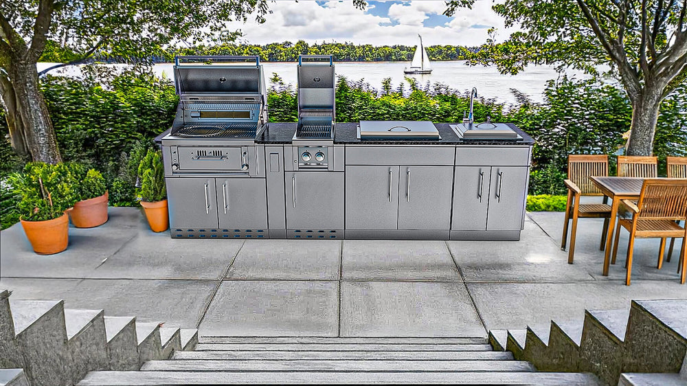 Sunstone Alamo Hybrid Grill Island 10 ft on lakeside patio with open grill, side griller, sink, and cabinet storage