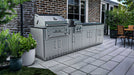 Sunstone Alamo Hybrid Grill Island 10 ft full front view with hybrid grill, side griller, ice chest, sink, and cabinets