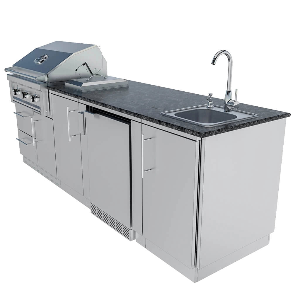 Angled view of Sunstone SCPBAYOU8.6 Bayou Outdoor Kitchen Island 8'6" showing stainless cabinets, granite countertop, sink and undercounter fridge.