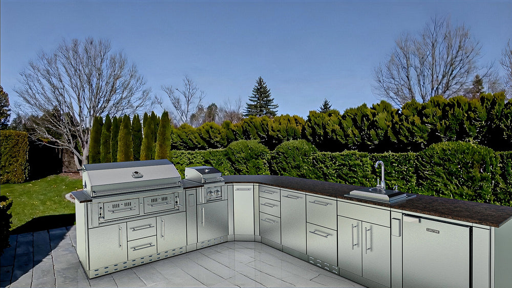 Sunstone Big-Texan 21ft outdoor kitchen island installed on a patio with L-shaped layout, stainless grill, side burner, fridge, and sink in landscaped backyard.