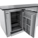 Sunstone Big-Texan 21-inch stainless outdoor refrigerator with door open, showing wire shelves and door bins.