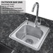 Close-up of Sunstone A-SS17 17-inch outdoor bar sink with hot and cold faucet, soap dispenser, and kitchen-sized drain in a stainless steel outdoor kitchen.