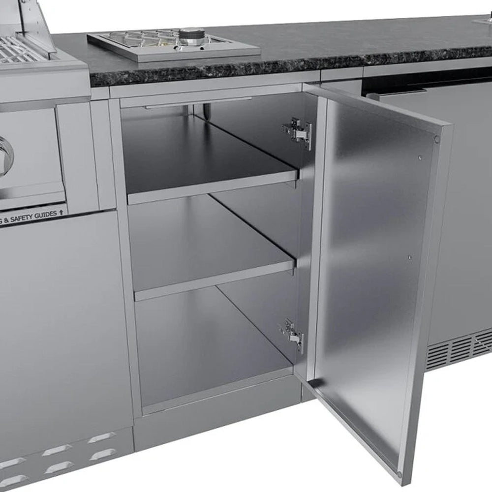 Open single door stainless steel storage cabinet for the Brazos outdoor kitchen island showing adjustable interior shelving and 304-grade construction.