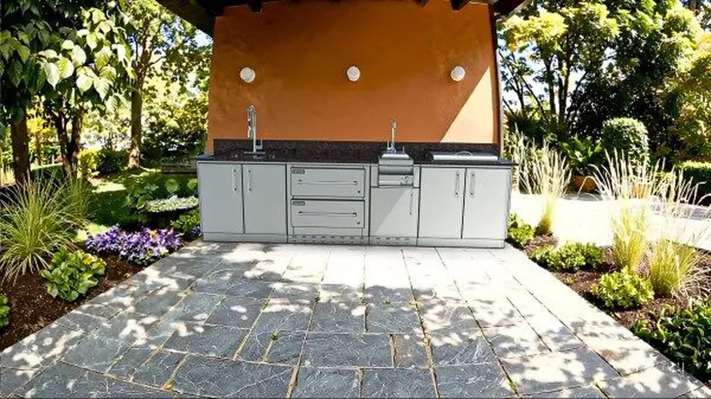 Sunstone SCPGALLEY10.8 Galley Clean & Prep Island installed outdoors on patio, stainless cabinets with granite top, sink and prep stations.