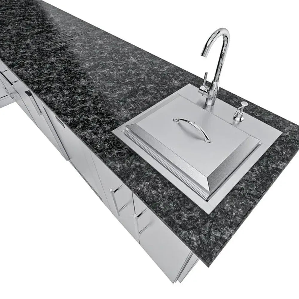 Sunstone Rancher L-shaped island (SCPRANCHER8.10BY11) close-up of sink cover and faucet set into black granite countertop.