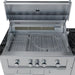 Interior view of a Sunstone professional series gas grill with heavy-duty stainless steel grates and integrated rotisserie burner.