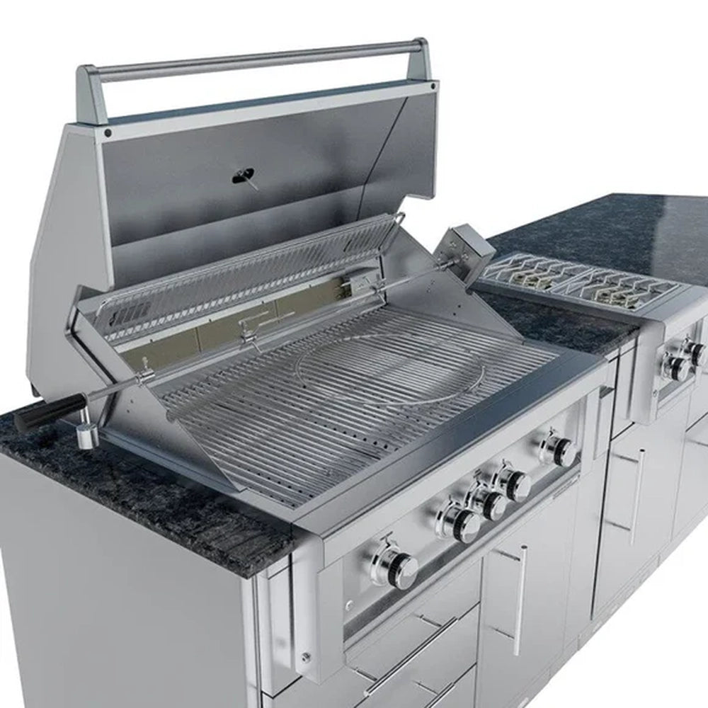Side profile of the Sunstone Savanna angled island showing the open Ruby grill with rotisserie attachment and extensive under-counter storage cabinets.