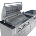 Side profile of the Sunstone Savanna angled island showing the open Ruby grill with rotisserie attachment and extensive under-counter storage cabinets.