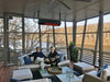 Contemporary covered deck with a SunStar SGL0 48-inch infrared heater mounted seamlessly to a ceiling joist.