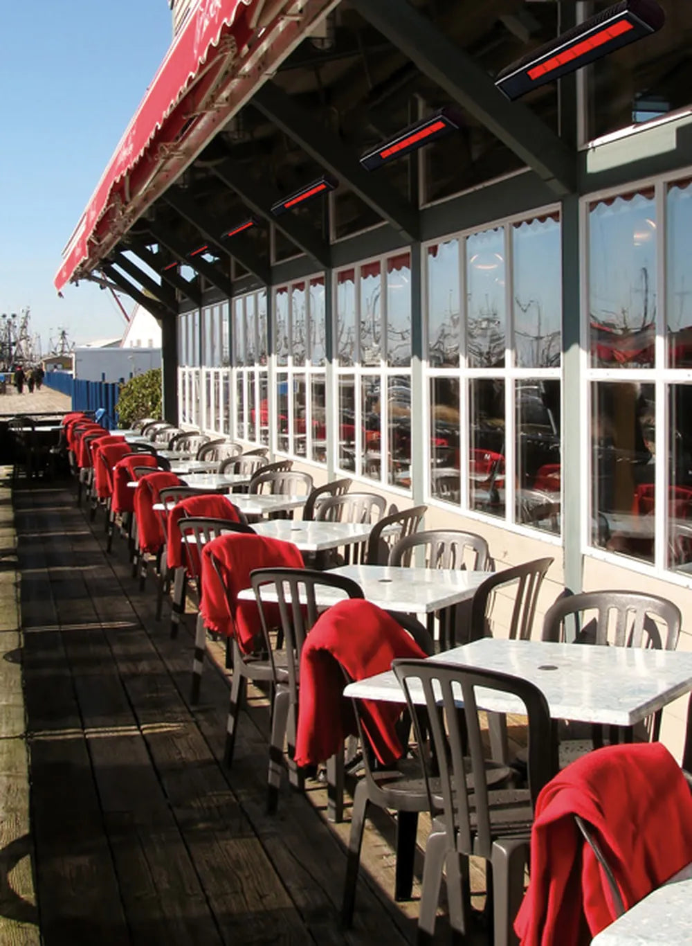 Outdoor event lounge kept cozy with a sleek, low-profile SunStar SGL0 remote-start gas heater.
