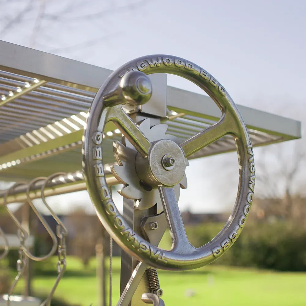 Tagwood BBQ26SS XL Santa Maria grill crank wheel close up for adjustable grate height control