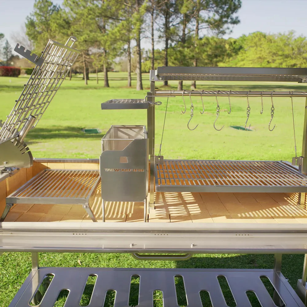 Tagwood BBQ26SS XL Santa Maria grill interior cooking area with charcoal basket and stainless grates