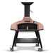 WPPO Red Rock 100 wood-fired stone oven with pink dome, black chimney, wheeled cart, thermometer, and storage shelf.