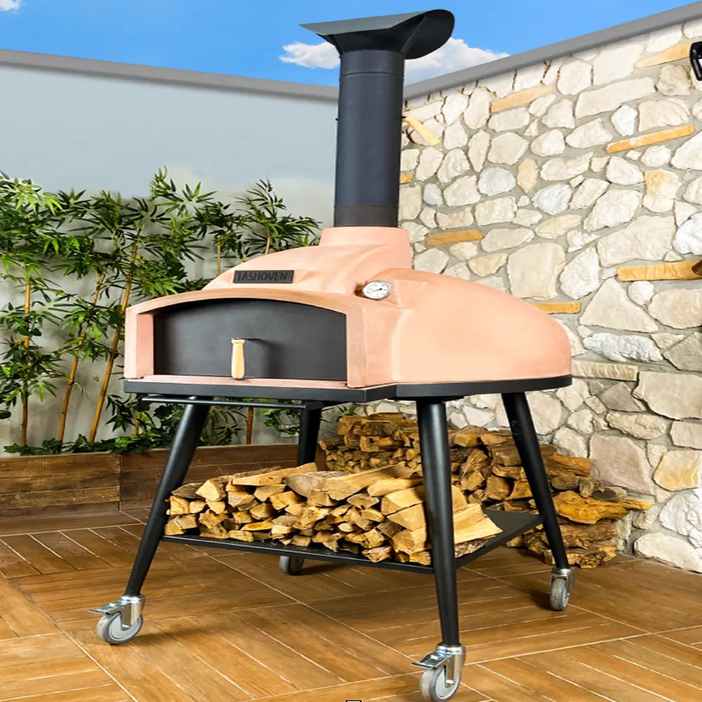 WPPO Red Rock 100 outdoor wood-fired stone oven on patio with firewood storage, chimney, caster wheels, and peach dome.