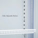 Close-up of the fully adjustable shelf tracking system and LED lighting strip inside the KingsBottle G380 upright cooler.