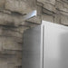 Side view of Sunstone SWC12ECR crown molding end panel installed on a 304 stainless steel upper wall cabinet.