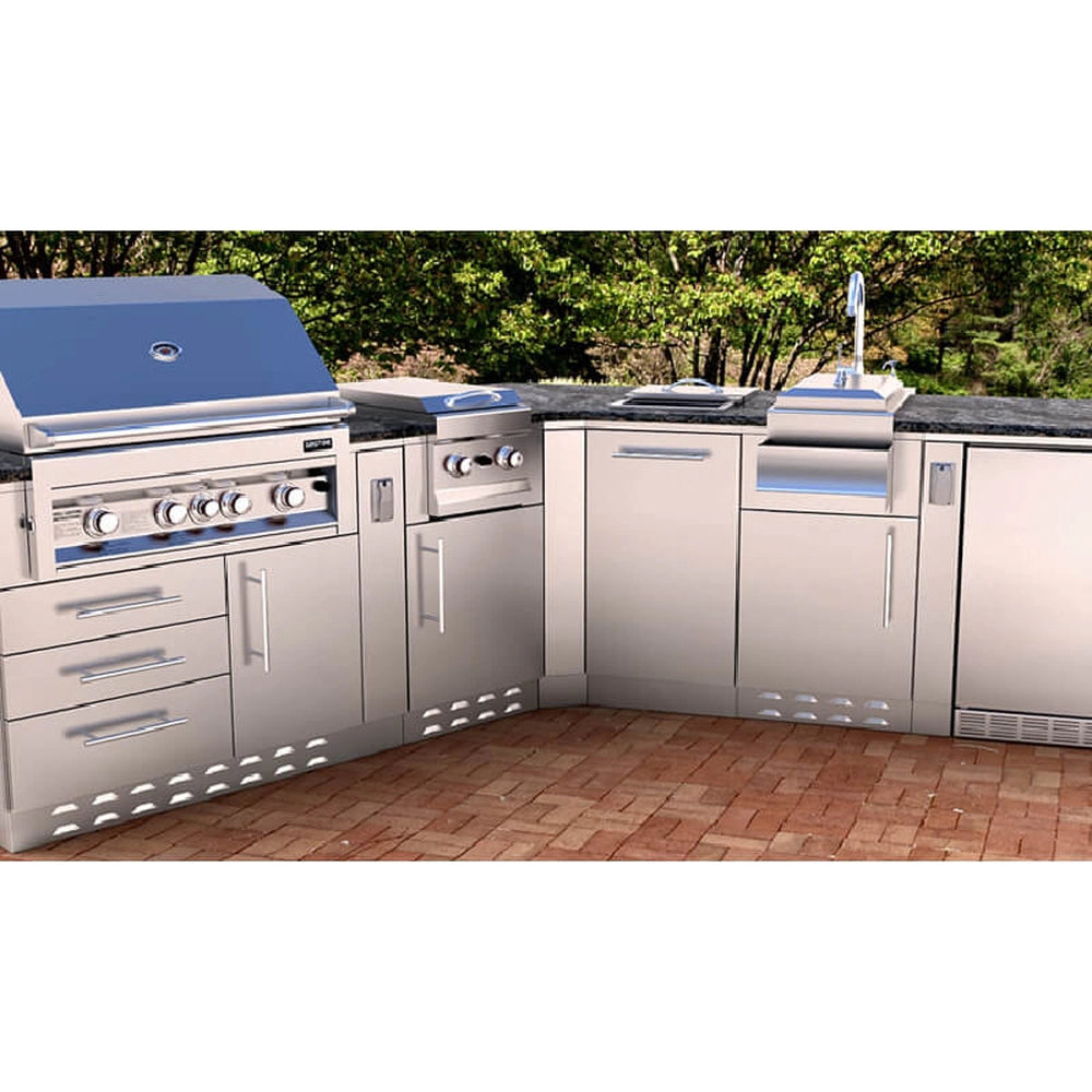 Integrated Sunstone SBC18STRD trash drawer installed in a modular outdoor kitchen island with a gas grill and sink.