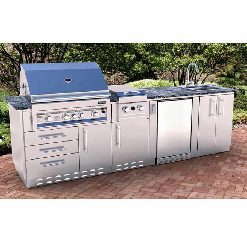Outdoor kitchen island featuring Sunstone stainless grill, side burner, sink, and SAC20CSDR 20" appliance cabinet with right door for storage.