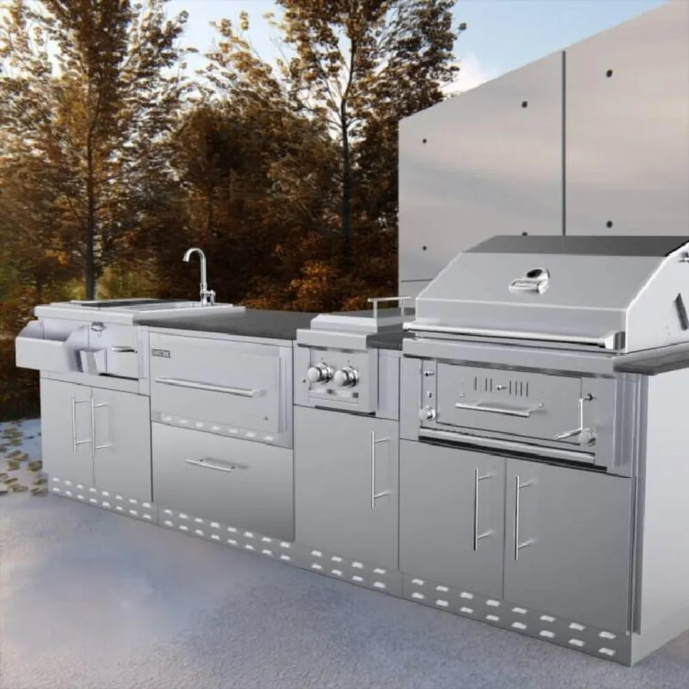 Sunstone outdoor kitchen island with SAC34SWC 34" warming drawer cabinet installed beside sink, side burner, and grill in stainless steel setup.