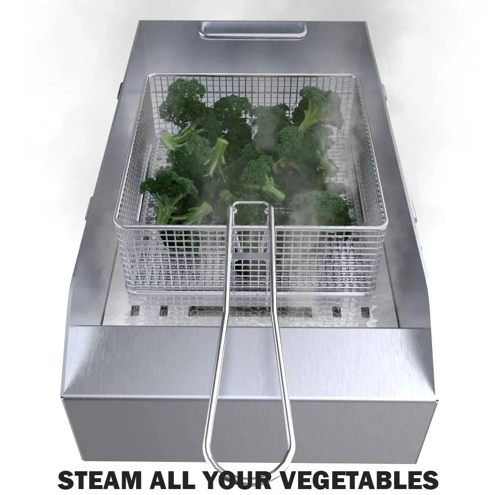 Sunstone wire basket steaming broccoli in stainless deep fryer insert, top view with visible steam.