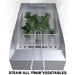 Sunstone wire basket steaming broccoli in stainless deep fryer insert, top view with visible steam.