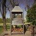 Tagwood BBQ BBQ02SS Argentine grill front view with log storage and side shelves