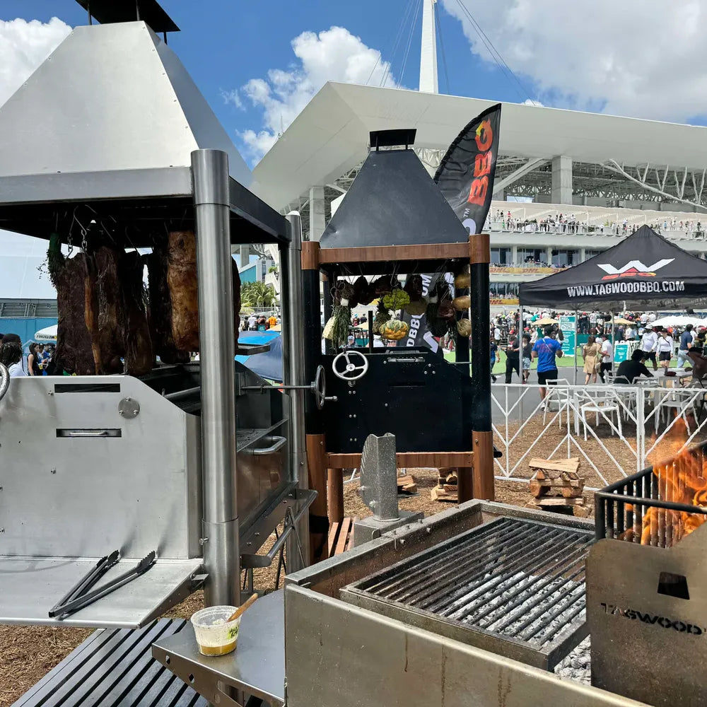 Tagwood BBQ BBQ02SS Santa Maria Grill SS304 at outdoor BBQ festival with open fire cooking