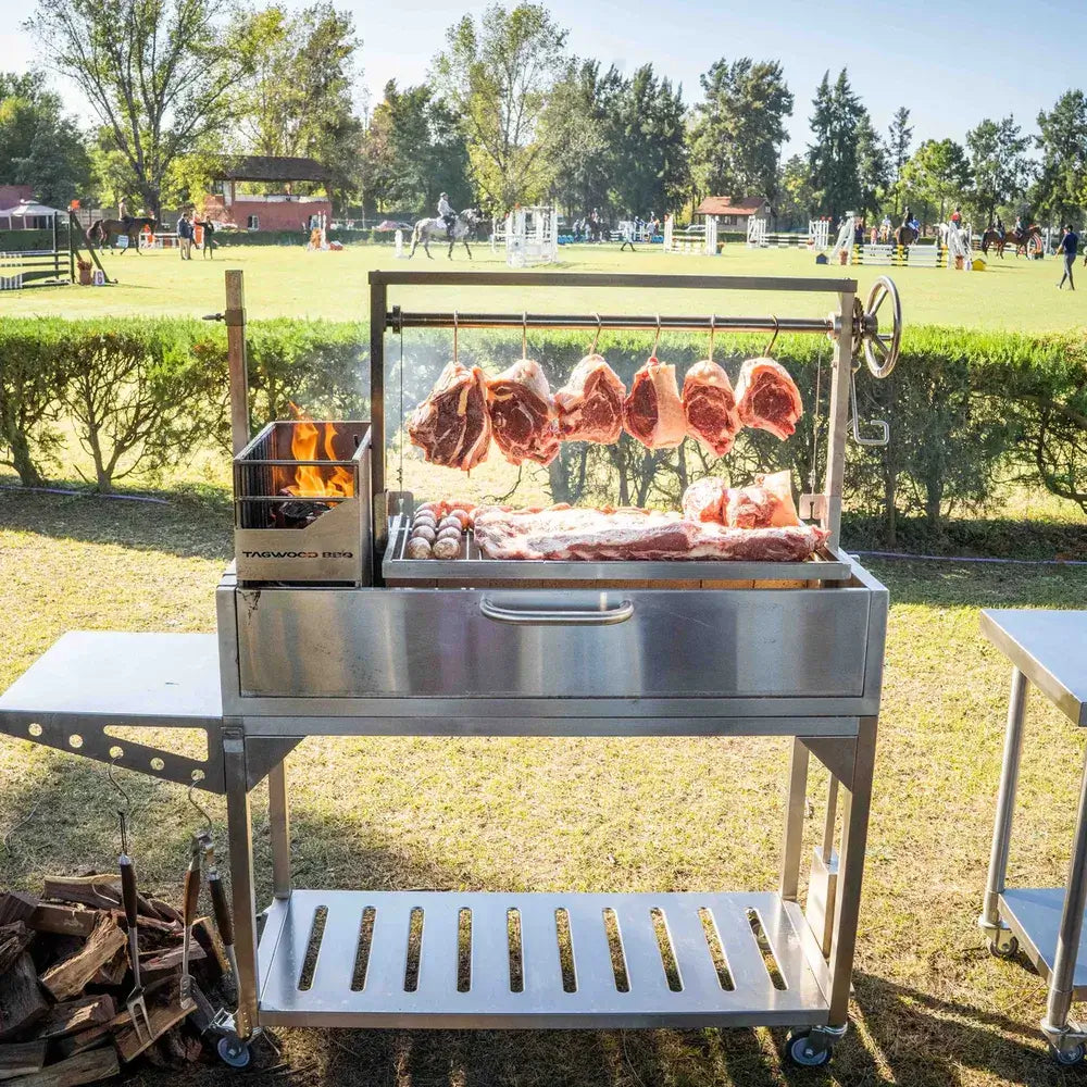Tagwood BBQ03SS Santa Maria grill Argentine style cooking with hanging ribeye steaks