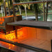 Tagwood BBQ03SS Santa Maria grill side brazier with flames and cooking grate above