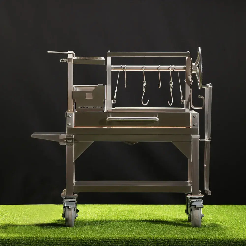 Tagwood BBQ03SS Mini Santa Maria grill 304 stainless steel front view on cart with hooks and crank lift