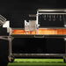 Tagwood BBQ06SS Santa Maria grill studio side view showing firebrick lined firebox
