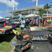 Tagwood BBQ03SS Mini Santa Maria grill cooking meat at outdoor tailgate barbecue event