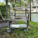 Tagwood BBQ03SS Mini Santa Maria grill stainless steel cart setup by waterfront backyard