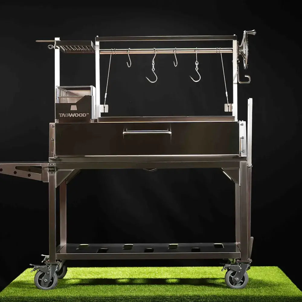 Tagwood BBQ23SS XL Santa Maria grill front studio view with hanging hooks and crank system