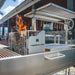 Tagwood BBQ26SS XL Santa Maria grill side close-up of charcoal starter basket and grill frame