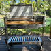 Tagwood BBQ18SS stainless steel Gaucho charcoal grill front view with lid open outdoors