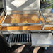 Tagwood BBQ18SS stainless steel cooking grate over firebrick charcoal base