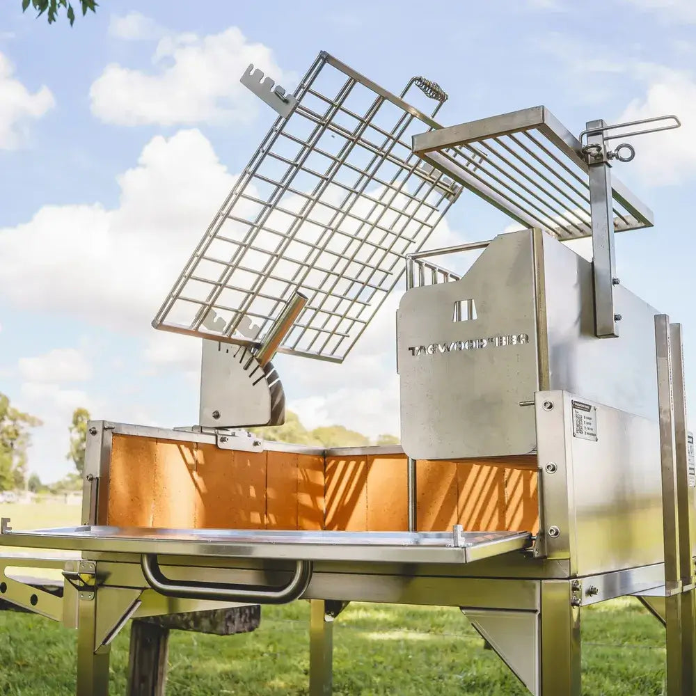 Tagwood BBQ33SS Argentine clamp grill rear side view with removable cooking grate and storage shelf