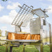Tagwood BBQ33SS Argentine clamp grill rear side view with removable cooking grate and storage shelf