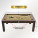 Dimension guide infographic for the 7-foot Freetime Fun Transformer 4-in-1 Game Table. The top-down view shows the espresso-finished table setup for pool, labeled with measurements of 7 feet in length, 4 feet in width, and 31.5 inches in height, alongside callouts pointing to the built-in accessory storage at each end.