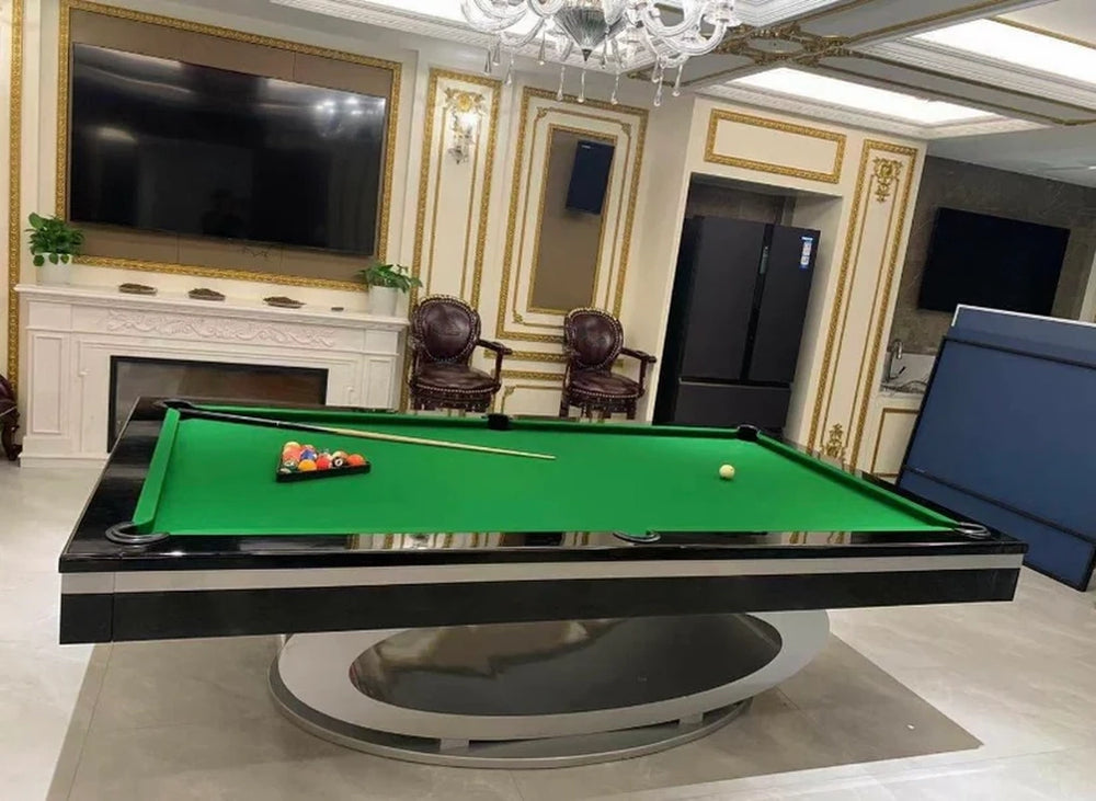 Side view of White Billiards Sierra slate pool table with green felt and elegant backdrop