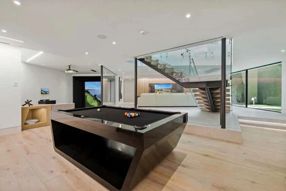 White Billiards Sofia modern black pool table with black felt in luxury game room