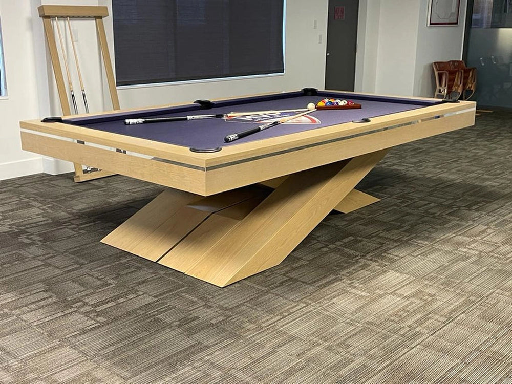 Angled view of White Billiards Ultimate pool table with light oak base and purple felt