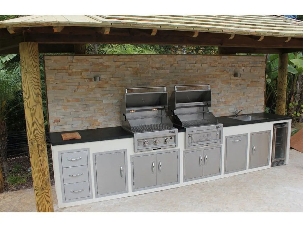 Outdoor kitchen island example featuring Sunstone stainless doors/drawers, including a double access door used for under-counter storage/utility access.