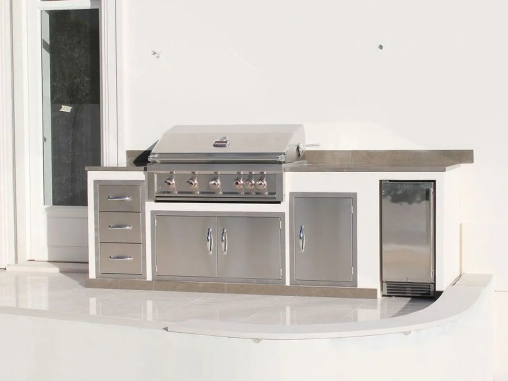 Outdoor kitchen island example featuring Sunstone stainless doors/drawers, including a double access door used for under-counter storage.