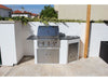 Sunstone vented access door installed on an outdoor kitchen island with built-in grill and sink – stainless access panel adds clean service access and ventilation.