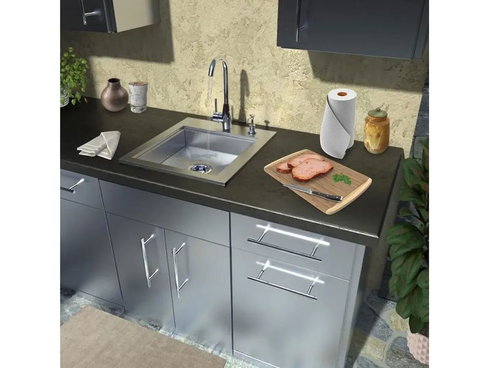 Sunstone ADASK20 ADA compliant outdoor kitchen sink installed in countertop with faucet and soap dispenser, stainless bar prep sink.